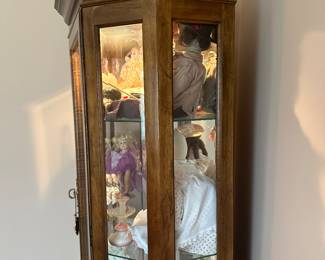 A sweet lighted OAK corner curio cabinet! This would be a great display piece for all your small treasures!