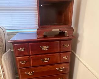 The primary bedroom in this sweet Thomas Township home has a beautiful 4 piece bedroom set to go along with the full size adjustable bed. A FULL Dresser and mirror combo, Tall Boy Dresser, Nightstand and matching TV stand! All are in excellent condition!