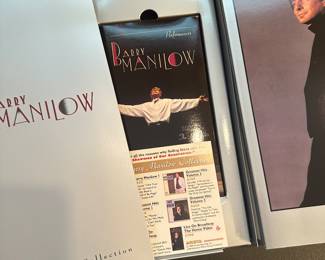 This Barry Manilow CD set is a collector's edition, including "The Complete Collection And Then Some" in a silver tall/DVD case. The set also includes a book and VHS, making it perfect for fans of Manilow's 1970s and 1980s pop rock and easy listening style. The record label is Collectables. The set was released in 1992 in the United States and features music in the English language. This is a great addition to any music collection for any occasion.