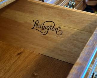 A beautiful SOLID OAK LEXINGTON Bedroom ensemble! A LARGE dresser with mirror, a Tall Boy Dresser w/cupboard, A night Stand, and a Tall undergarment dresser with makeup/jewelery mirror!