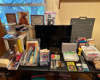 The front bedroom is filled with SEWING/KNITTING accessories!