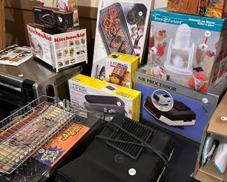 Here is a nice close up of the table! The things in the back in their boxes are almost ALL Brand New!