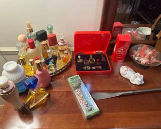 There are loads of smalls at this sale! MANY new or like new! Perfect for the upcoming holiday season! This is a small shot of the many bottles of perfume and perfume sets.