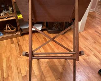 This is an unusual piece. It is a wooden, adjustable easel for painting! It has on it a great old vintage Last Supper outline.