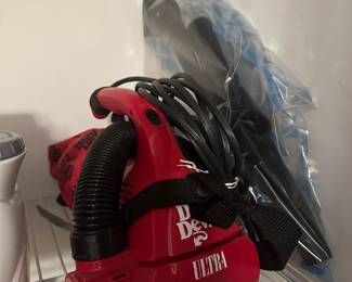 A nice Dirt Devil hand held vacuum with all attachments! 