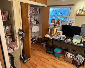 The front bedroom is filled with SEWING/KNITTING accessories! 