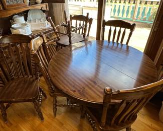 This is an excellent dining room table and chairs. The table is expandable with two HUGE 2 foot leaves. One captain chair and 5 other chairs! Solid wood with great finish! Would be terrific for the up coming Thanksgiving feast! ALSO - comes with felt pads (4 pcs) for the table closed and fully extended! 