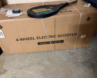 NIB 4 wheel scooter/ more pics coming on Friday