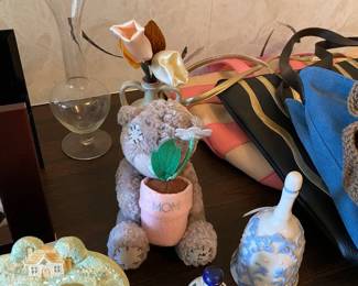 frame, ceramic bells, stuffed animal, glass vase, purses, handbags