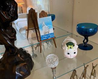 Sculptures, figurines, statues, glass, ceramic pig bank, brass dolphin, brass candlestick, brass deer