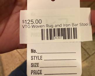 Vintage woven rug and iron bar stool 