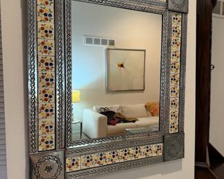Vintage punched tin and tile mirror