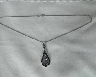 14K White Gold Floating Pendant with (7) Invisibly Set Round Diamonds on 14K White Gold Wheat Chain