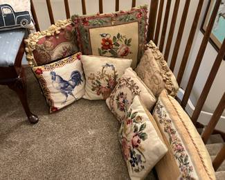 Tons of needlepoint pillows