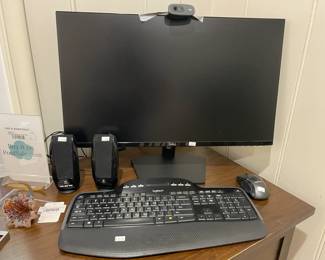 Dell Monitor, Logitech Keyboard and Mouse, Logitech Speakers

