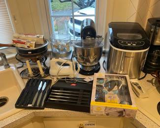 Zwilling 8-Piece Steak Knife Set, KitchenAid Artisan Black Mixer, Magic Chef Countertop Ice Maker, Wilton Cookie Press, Cuisinart Coffee Maker, KitchenAid Hand Mixer
