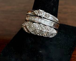 Bottom: 10K and .25ct wt. Middle: 14K channel set diamonds. Top: 10k triple diamond ring 
