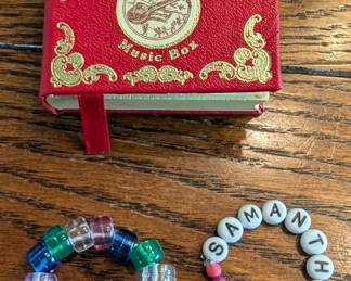 American Girl music box book, bracelets