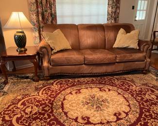 Bassett aniline leather sofa with natural markings. 