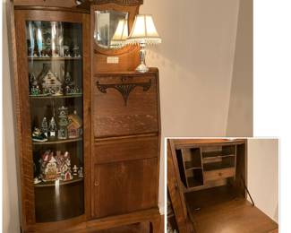 Antique side-by-side oak secretary and display cabinet with curved glass.  