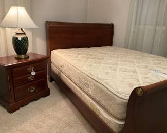 Queen sleigh bed by Vaughan Furniture Company.