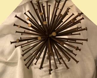 Metal nail atomic orb sculptures (2).