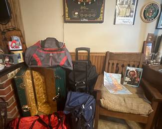 Trunk; Duffle Bags; Electronic Dart Board; Side Chair