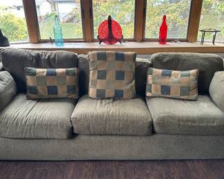 Couch and Pillows; Decorative Glass Bottles