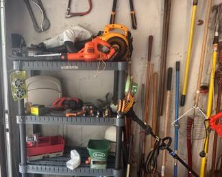 Remington Pole Saw; Poulan Pro Gas Blower; Black and Decker Electric Cordless Blower; Sprinkler; Hand Saw; Long Handled Clippers; Garden Tools; Gas Cans; Hedge Trimmers; Long Handled Garden Tools; Scott's Hand Spreader