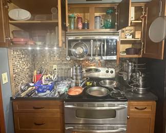 Plastic Storage Containers; Utensils; Pampered Chef Garlic Press; Stainless Steel Masterclass Premium Cookware; Colanders; Calphalon Large 12in  Skillet 1392; Copper Chef 8in Skillet; Wolfgang Pucks Cafe Collection Cookware; Swissman Cheese Grater; Rolling Pin; Pampered Chef Cheese Grater; Pampered Chef Micro Steamer Cooker