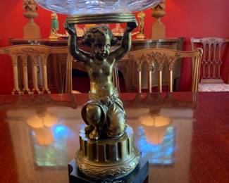 "Bronze" cherub holding crystal bowl