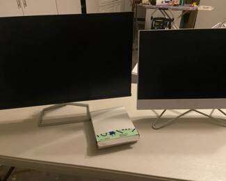 An HP Monitor And An HP Computer