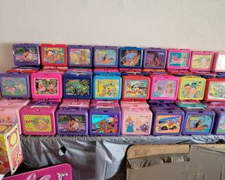 A ton of vintage lunch boxes.