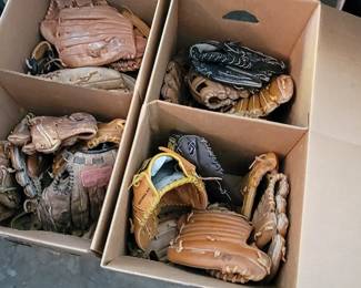 Baseball gloves.