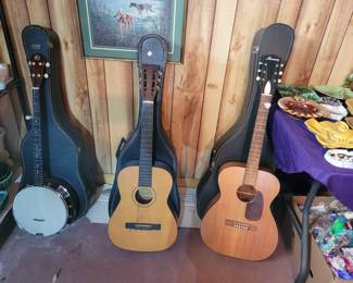 Guitar on the right is a 1969 Harmony H-162 Grand Concert "Cedar '69" Guitar