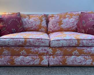 Brunschwig & Fils Charlton Loose-Back, Down-Filled Upholstered Sofa in Manuel Canovas Bengale Toile Fabric (Paprika Colorway). Measures 78" W x 34" D. Photo 1 of 5. 
