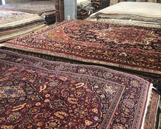 Many rugs antique and new at lowest price s
