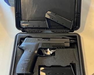 This one comes with case and 4 magazines