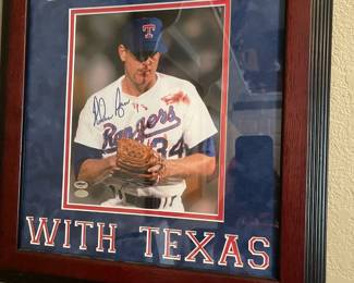 Signed Iconic Photo of  Nolan Ryan after being hit in the mouth by a ball off the bat of Bo Jackson in September 1990. Ryan continued pitching after the injury, throwing seven innings of one-run ball. He said he didn't let the injury affect him, and that he kept going because that's what hard work is about. Ryan got his stitches after the game.
