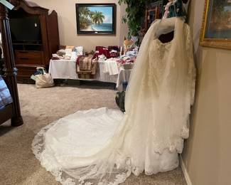 Beautiful long train covered in lace and the most beautiful sleeves