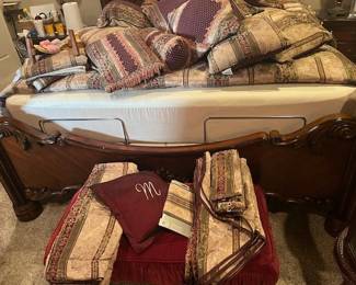 Wonderful cushions, shams, rolls, window treatment pieces with full length curtains in the master closet and sheers on the linen table