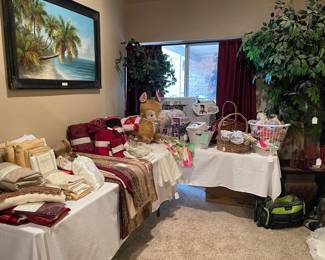 Looking at the linen tables, large faux tree and plant