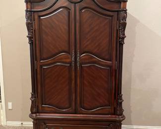 Cherry entertainment cabinet or great linen storage