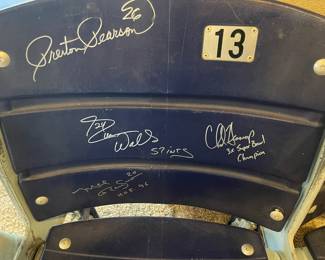 Close up of seat # 13 signed by Preston Pearson, Everson Walls, Cliff Harris, Mel Renfro