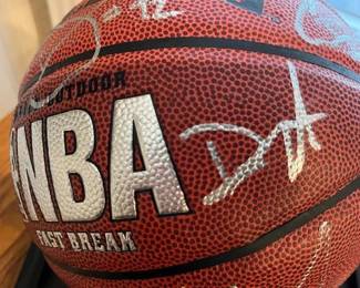 Multi Signed Dallas Mavericks 2011 NBA Champions Basketball!  /Dominique Jones on the right of the NBA logo. This basketball has 15 signatures including Dirk Nowitzki/Jason Kidd/ Jason Terry/Tyson Chandler/Head Coach Rick Carlisle/Owner Mark Cuban... See next 14 photos