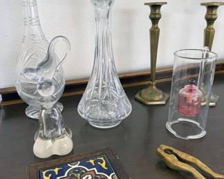 Assorted cut crystal decanters,  brass candlesticks + decor