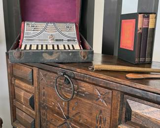 La Tosca Gretsch accordion in case on top of Repro Spanish walnut cabinet/desk (“bargueno”) on stand