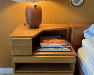 This is one of two nightstands whose style matches the king-sized bed.  