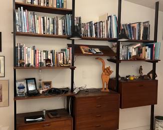 First up is this George Nelson-style wall/shelf unit, held in place by tension rods.  