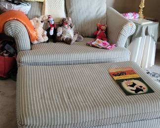 Lovely Pin-Stripped Love Seat and Matching Ottoman also pictured: Childrens Vintage Plush Animals and Books plus Table Lamp, Afghan and more!